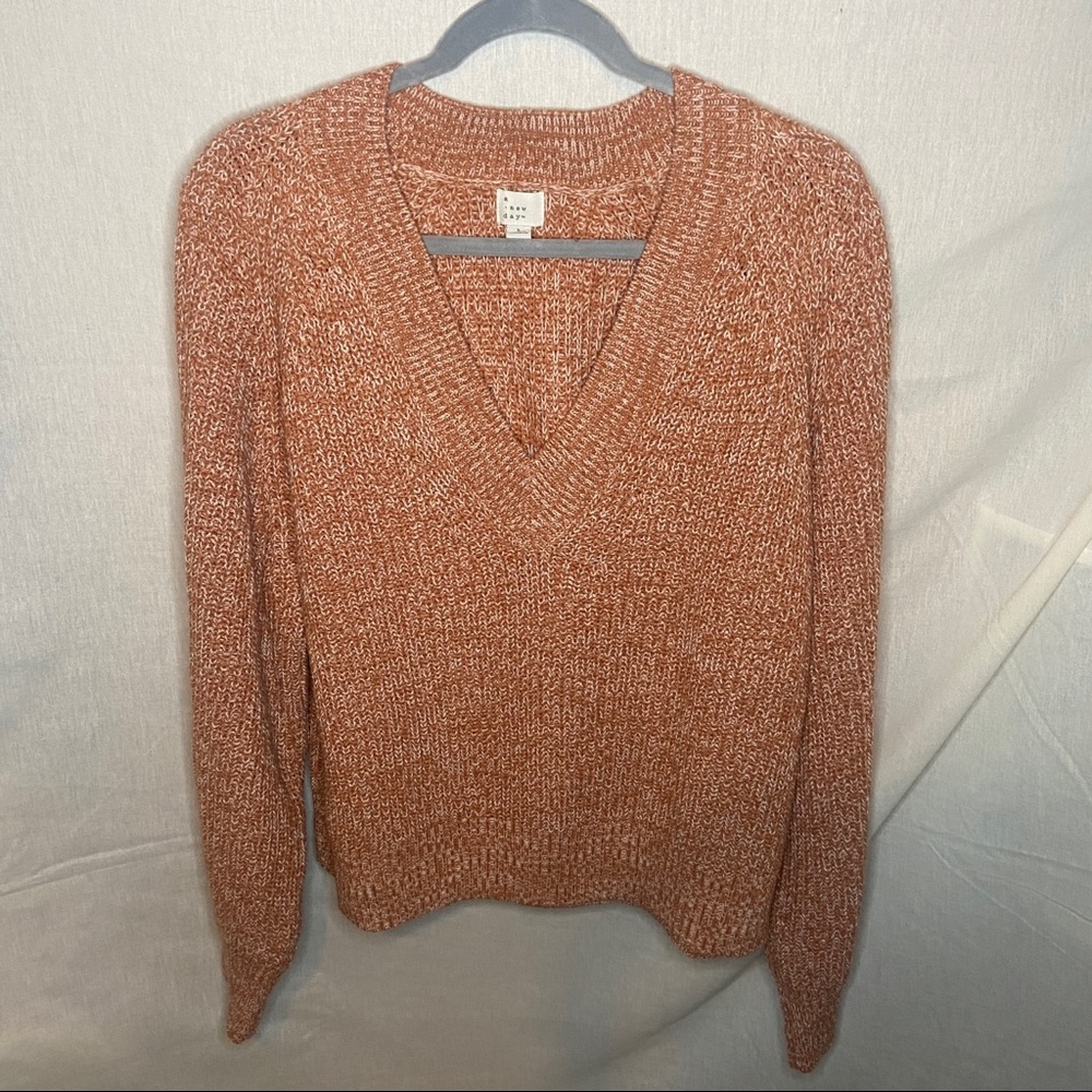 A New Day V-neck Sweater